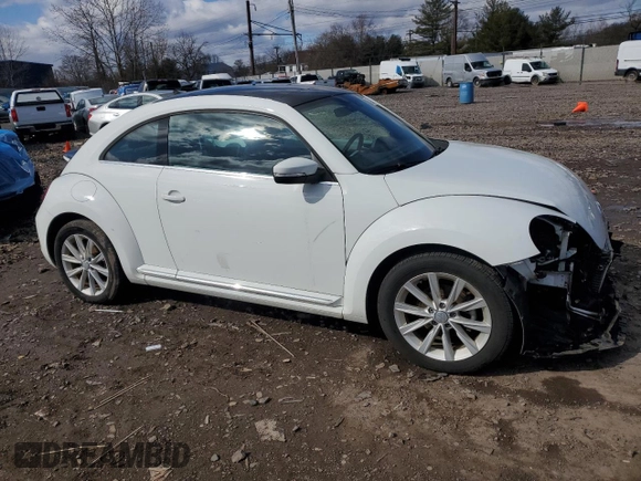 2019 Volkswagen Beetle SE with VIN 3VWJD7AT7KM707314, listed as a Copart auction lot 45299335 with 35,919 mi miles and Salvage title. Bid and sale history available at DreamBid. Image 4.