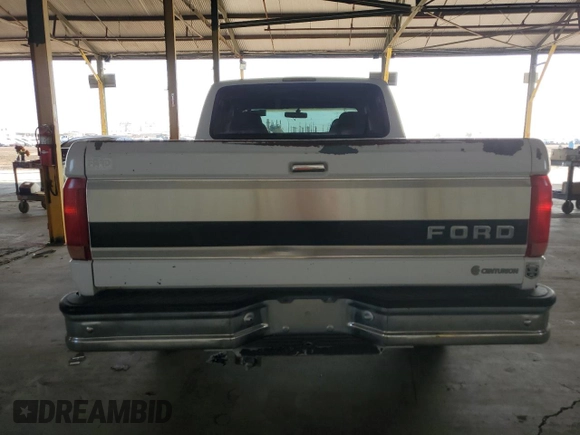 1995 Ford F-150 with VIN 1FTEF14H7SLA53001, listed as a Copart auction lot 82024754 with 133,155 mi miles and Salvage Title. Bid and sale history available at carsss.com. Image 6.