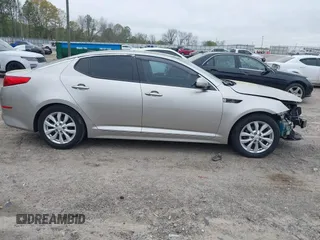 2015 Kia Optima EX with VIN 5XXGN4A76FG409159, listed as a IAAI auction lot 41937814 with 120,641 mi miles. Bid and sale history available at carsss.com. Image 14.