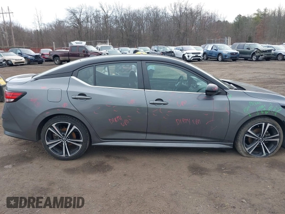 2021 Nissan Sentra SR z VIN 3N1AB8DV4MY302599, wystawiony jako IAAI lot #41662536 z przebiegiem 36 905 mil mil oraz . Historia ofert i sprzedaży dostępna na DreamBid. Obrazek 14.