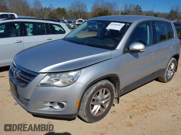2011 Volkswagen Tiguan SE with VIN WVGBV7AX5BW549090, listed as a IAAI auction lot 41550983 with 153,739 mi miles and . Bid and sale history available at DreamBid. Image 2.