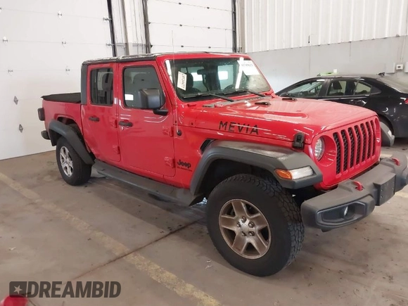 2020 Jeep Gladiator Sport S z VIN 1C6HJTAGXLL125496, wystawiony jako IAAI lot #41749633 z przebiegiem 56 203 mil mil oraz . Historia ofert i sprzedaży dostępna na DreamBid. Obrazek 1.