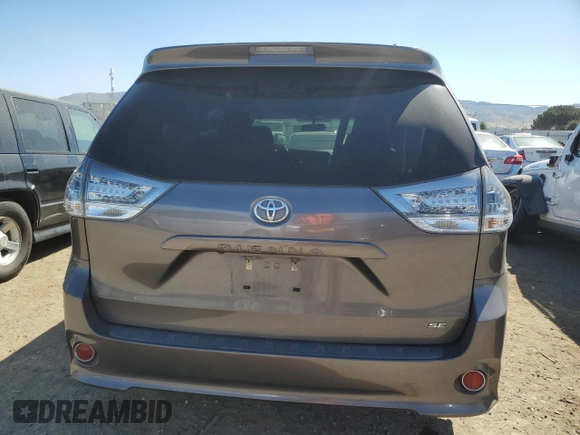 2017 Toyota Sienna SE with VIN 5TDXZ3DC5HS766941, listed as a Copart auction lot 56222045 with 94,250 mi miles and Salvage title. Bid and sale history available at DreamBid. Image 6.