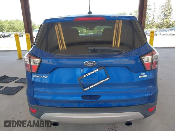 2017 Ford Escape SE with VIN 1FMCU0G9XHUC81634, listed as a IAAI auction lot 42180555 with 193,274 mi miles and . Bid and sale history available at DreamBid. Image 17.