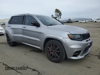 2017 Jeep Grand Cherokee SRT with VIN 1C4RJFDJ8HC663059, listed as a Copart auction lot 45677045 with 88,914 mi miles and Salvage Title. Bid and sale history available at carsss.com. Image 4.