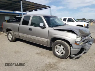 2000 Chevrolet Silverado 1500 LS with VIN 2GCEC19T3Y1202329, listed as a Copart auction lot 52712345 with 149,669 mi miles and Salvage Title. Bid and sale history available at DreamBid. Image 4.