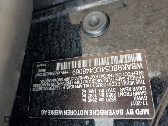 2012 BMW 7 Series 750Li z VIN WBAKB8C54CC448069, wystawiony jako Copart lot #59104045 z przebiegiem 129 883 mil mil oraz Szkoda całkowita • Salvage title. Historia ofert i sprzedaży dostępna na DreamBid. Obrazek 13.