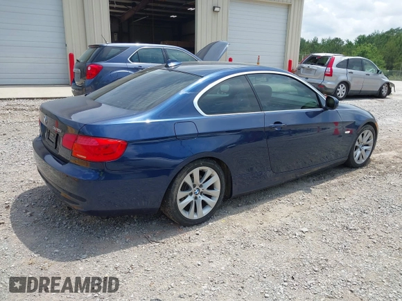 2011 BMW 3 Series 328i with VIN WBAKE3C52BE557501, listed as a IAAI auction lot 42138050 with 209,575 mi miles and . Bid and sale history available at carsss.com. Image 4.