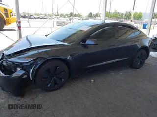2025 Tesla Model 3 Long Range with VIN 5YJ3E1EA5SF978214, listed as a IAAI auction lot 42525444 with 6,489 mi miles and . Bid and sale history available at DreamBid. Image 18.