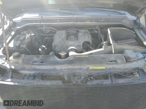 2006 Nissan Titan LE z VIN 1N6AA07B86N516155, wystawiony jako Copart lot #49080025 z przebiegiem 152 345 mil mil oraz Szkoda całkowita • Salvage title. Historia ofert i sprzedaży dostępna na DreamBid. Obrazek 12.