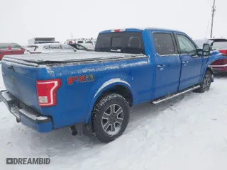 2015 Ford F-150 XLT w/HD Payload Pkg with VIN 1FTFW1EGXFKE05722, listed as a IAAI auction lot 41575776 with 1 mi miles. Bid and sale history available at carsss.com. Image 4.