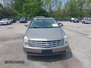 2006 Cadillac DTS 1SD z VIN 1G6KD57Y06U197794, wystawiony jako IAAI lot #42226706 z przebiegiem 135 748 mil mil oraz . Historia ofert i sprzedaży dostępna na DreamBid. Obrazek 12.