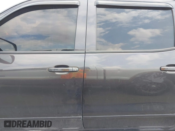 2015 Chevrolet Silverado 1500 LT with VIN 3GCPCREC7FG411610, listed as a IAAI auction lot 41975360 with 243,335 mi miles and . Bid and sale history available at DreamBid. Image 14.