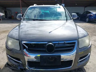 2010 Volkswagen Touareg VR6 with VIN WVGBF7A96AD002466, listed as a IAAI auction lot 41709052 with 204,819 mi miles and . Bid and sale history available at DreamBid. Image 12.