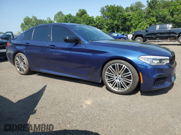 2020 BMW 5 Series M550i xDrive with VIN WBAJS7C0XLBN96338, listed as a Copart auction lot 60591815 with 73,910 mi miles and Salvage title. Bid and sale history available at DreamBid. Image 4.