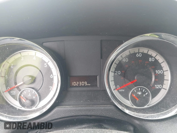 2018 Dodge Grand Caravan SXT with VIN 2C4RDGCGXJR283091, listed as a IAAI auction lot 41966553 with 102,309 mi miles and . Bid and sale history available at DreamBid. Image 7.