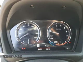 2019 BMW X1 xDrive28i with VIN WBXHT3C51K3H35953, listed as a Copart auction lot 54751675 with 54,802 mi miles and Salvage title. Bid and sale history available at DreamBid. Image 9.