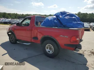 1997 Ford F-150 XL with VIN 1FTDF08W4VKC28068, listed as a Copart auction lot 68435244 with 247,677 mi miles and Salvage Title. Bid and sale history available at carsss.com. Image 2.