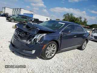 2014 Cadillac XTS Premium with VIN 2G61P5S32E9202312, listed as a Copart auction lot 43120235 with 109,745 mi miles and Salvage Title. Bid and sale history available at carsss.com. Image 1.