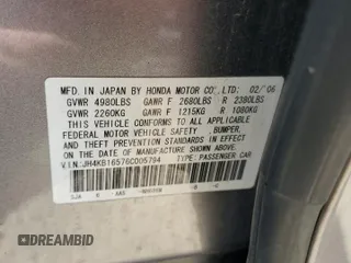 2006 Acura RL z VIN JH4KB16576C005794, wystawiony jako Copart lot #55167965 z przebiegiem 157 104 mil mil oraz Szkoda całkowita • Salvage title. Historia ofert i sprzedaży dostępna na DreamBid. Obrazek 13.