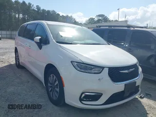 2023 Chrysler Pacifica Hybrid Touring L with VIN 2C4RC1L79PR595055, listed as a IAAI auction lot 41947367 with 44,980 mi miles and . Bid and sale history available at DreamBid. Image 1.