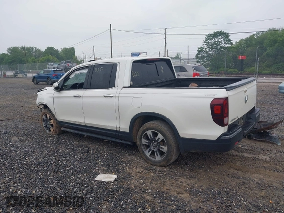 2018 Honda Ridgeline RTL-E with VIN 5FPYK3F77JB017293, listed as a IAAI auction lot 42422614 with 87,700 mi miles and . Bid and sale history available at DreamBid. Image 3.