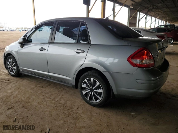 2010 Nissan Versa 1.8 S with VIN 3N1BC1APXAL416663, listed as a Copart auction lot 49631505 with 148,791 mi miles and Salvage Title. Bid and sale history available at carsss.com. Image 2.