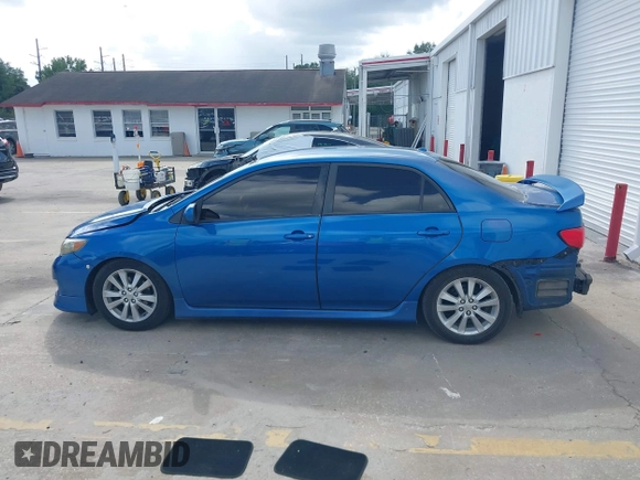 2009 Toyota Corolla with VIN 2T1BU40E69C154781, listed as a IAAI auction lot 42009936 with 180,039 mi miles. Bid and sale history available at carsss.com. Image 14.