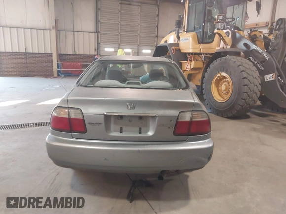 1996 Honda Accord LX with VIN 1HGCD563XTA141867, listed as a IAAI auction lot 41015252 with 420,800 mi miles and . Bid and sale history available at carsss.com. Image 16.