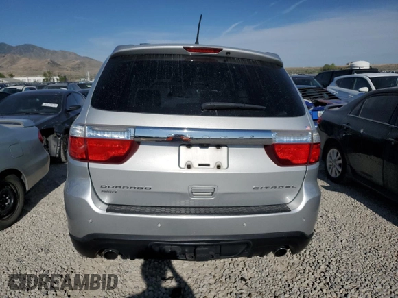 2013 Dodge Durango Citadel with VIN 1C4SDJET2DC602487, listed as a Copart auction lot 62308385 with 124,034 mi miles and Salvage title. Bid and sale history available at DreamBid. Image 6.