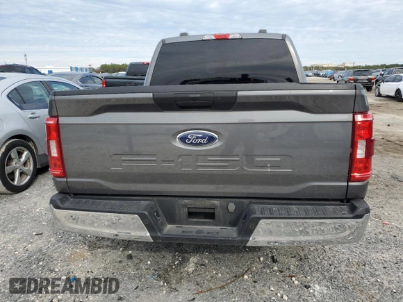 2023 Ford F-150 XL with VIN 1FTEW1EB0PKE65574, listed as a Copart auction lot 88522215 with 80,828 mi miles and Salvage Title. Bid and sale history available at carsss.com. Image 6.