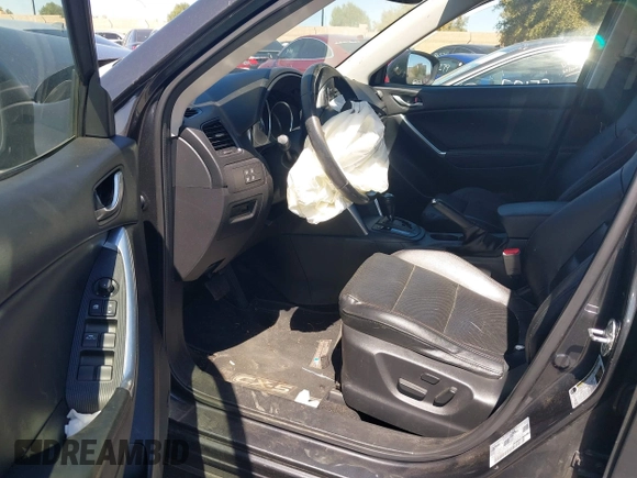 2014 Mazda CX-5 Grand Touring with VIN JM3KE4DY8E0391317, listed as a IAAI auction lot 41871641 with 77,048 mi miles. Bid and sale history available at carsss.com. Image 5.