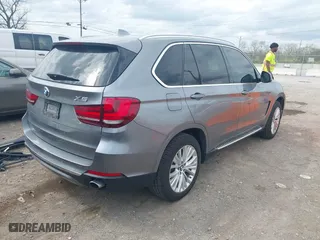 2016 BMW X5 xDrive35i with VIN 5UXKR0C53G0P19015, listed as a IAAI auction lot 41930862 with 150,762 mi miles. Bid and sale history available at carsss.com. Image 4.