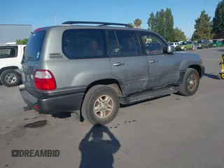 2001 Lexus LX 470 z VIN JTJHT00W113500583, wystawiony jako IAAI lot #42373922 z przebiegiem 269 323 mil mil oraz . Historia ofert i sprzedaży dostępna na DreamBid. Obrazek 4.