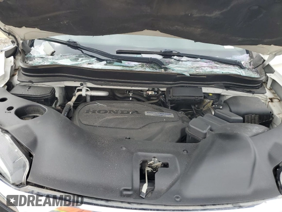 2017 Honda Pilot Touring z VIN 5FNYF6H92HB067140, wystawiony jako Copart lot #55757925 z przebiegiem 132 425 mil mil oraz Szkoda całkowita • Salvage title. Historia ofert i sprzedaży dostępna na DreamBid. Obrazek 12.