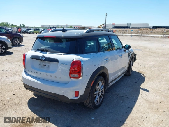 2018 MINI Countryman Cooper with VIN WMZYV5C37J3E03421, listed as a IAAI auction lot 42238016 with 93,810 mi miles and . Bid and sale history available at DreamBid. Image 4.