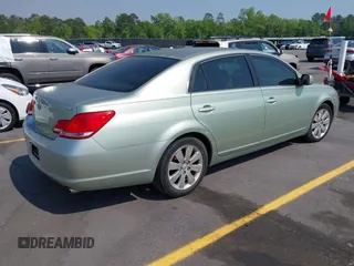 2007 Toyota Avalon XL with VIN 4T1BK36B67U252394, listed as a IAAI auction lot 41978589 with 256,359 mi miles. Bid and sale history available at carsss.com. Image 4.