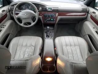 2001 Chrysler Sebring LXi z VIN 1C3EL55UX1N556511, wystawiony jako Copart lot #81047244 z przebiegiem 83 830 mil mil oraz Czysty tytuł • Clean title. Historia ofert i sprzedaży dostępna na DreamBid. Obrazek 8.