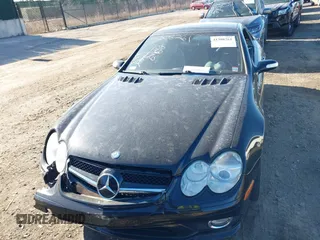 2005 Mercedes-Benz SL 55 AMG with VIN WDBSK74F75F099722, listed as a IAAI auction lot 41308261 with 60,134 mi miles and . Bid and sale history available at DreamBid. Image 12.