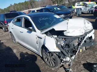 2016 Kia Optima SXL Turbo with VIN 5XXGV4L25GG012108, listed as a IAAI auction lot 41270664 with 119,974 mi miles. Bid and sale history available at carsss.com. Image 1.