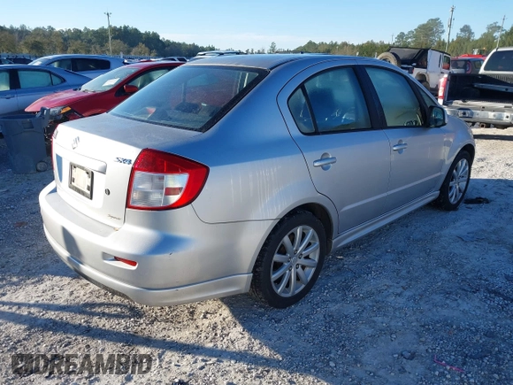 2010 Suzuki SX4 with VIN JS2YC5A46A6310134, listed as a IAAI auction lot 41696108 with 147,059 mi miles and . Bid and sale history available at DreamBid. Image 4.