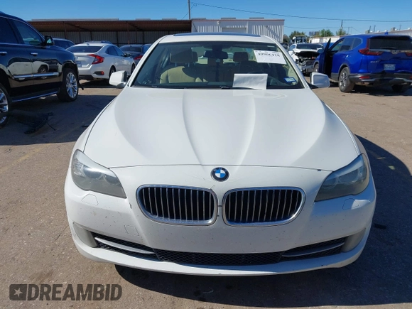 2013 BMW 5 Series 528i with VIN WBAXG5C56DDY31982, listed as a IAAI auction lot 40906428 with 248,336 mi miles and . Bid and sale history available at carsss.com. Image 11.