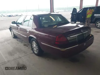 2006 Mercury Grand Marquis LS Premium z VIN 2MEHM75VX6X628404, wystawiony jako IAAI lot #42227639 z przebiegiem 170 132 mil mil oraz . Historia ofert i sprzedaży dostępna na DreamBid. Obrazek 3.