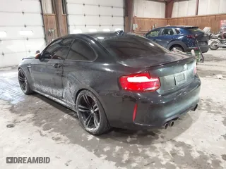 2018 BMW M2 with VIN WBS1J5C56JVD36919, listed as a IAAI auction lot 41587121 with 46,356 mi miles. Bid and sale history available at carsss.com. Image 3.