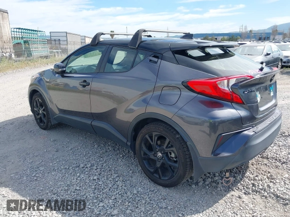2021 Toyota C-HR LE with VIN JTNKHMBX1M1120212, listed as a IAAI auction lot 41975849 with 62,228 mi miles. Bid and sale history available at carsss.com. Image 3.