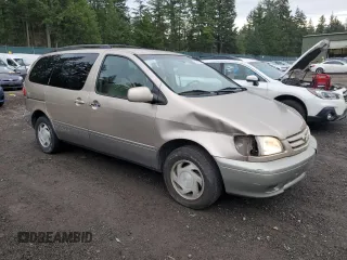 2002 Toyota Sienna LE with VIN 4T3ZF13C92U474786, listed as a Copart auction lot 83051724 with 195,429 mi miles and Salvage Title. Bid and sale history available at carsss.com. Image 4.