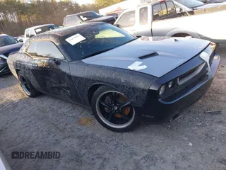 2016 Dodge Challenger R/T Scat Pack z VIN 2C3CDZFJ5GH177997, wystawiony jako IAAI lot #41470614 z przebiegiem 52 728 mil mil oraz . Historia ofert i sprzedaży dostępna na DreamBid. Obrazek 1.