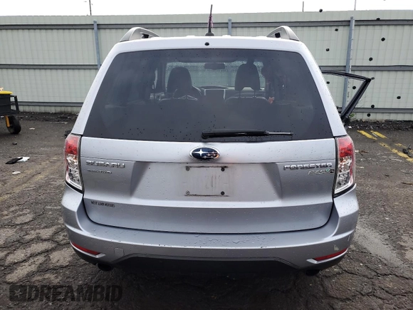 2013 Subaru Forester X Limited with VIN JF2SHAEC9DH424022, listed as a Copart auction lot 63052205 with 118,970 mi miles and Salvage title. Bid and sale history available at DreamBid. Image 6.