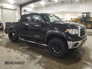 2010 Toyota Tundra 4WD Truck with VIN 5TFUM5F11AX006501, listed as a Copart auction lot 42424145 with 239,553 mi miles and Salvage Title. Bid and sale history available at carsss.com. Image 4.
