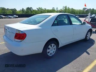 2006 Toyota Camry STD with VIN 4T1BE32KX6U734944, listed as a IAAI auction lot 42006245 with 243,967 mi miles. Bid and sale history available at carsss.com. Image 4.